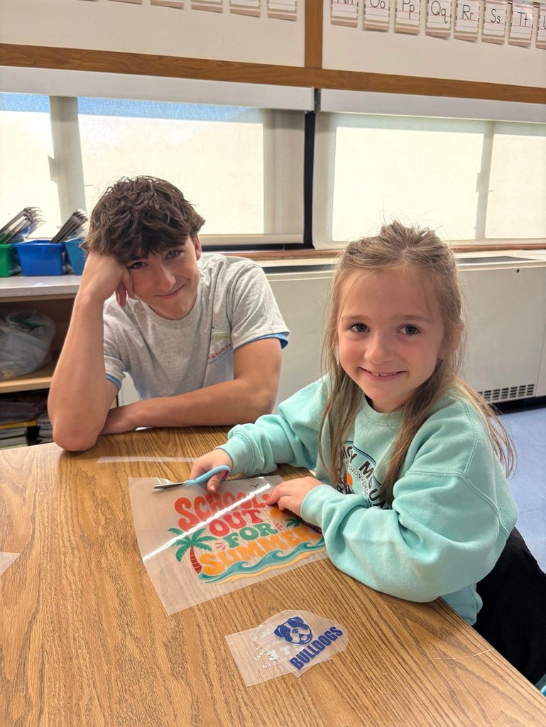AMP UP Algebra/Manufacturing students work with Besser First Graders