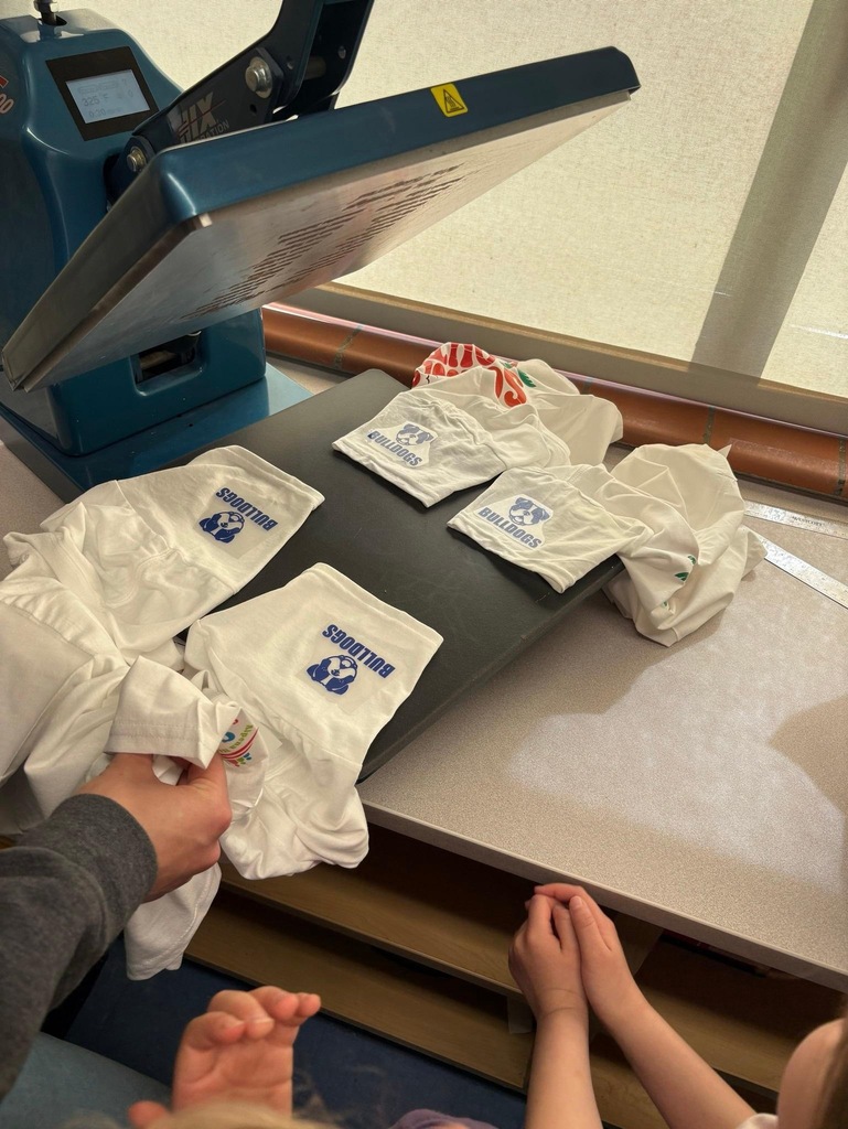 AMP UP Algebra/Manufacturing students work with Besser First Graders