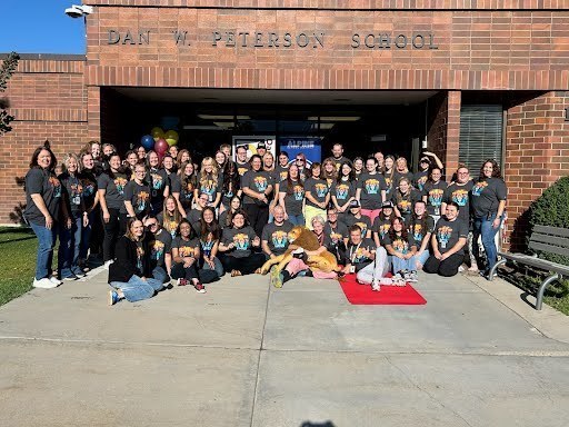 Dan Peterson school students in front of the school