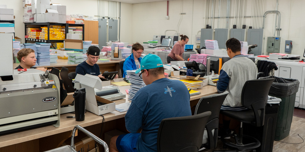 Students from ATEC working in ASD Printing Services