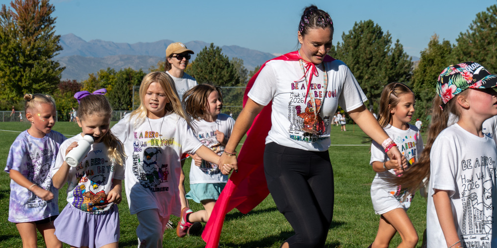 Students and community members participate in Highland Elementary's Hawk Walk
