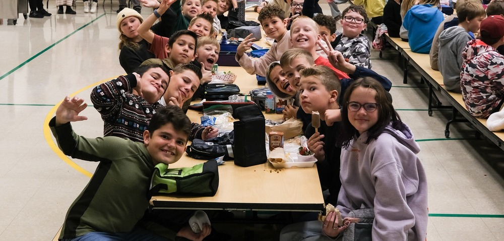 elementary students in a school cafeteria