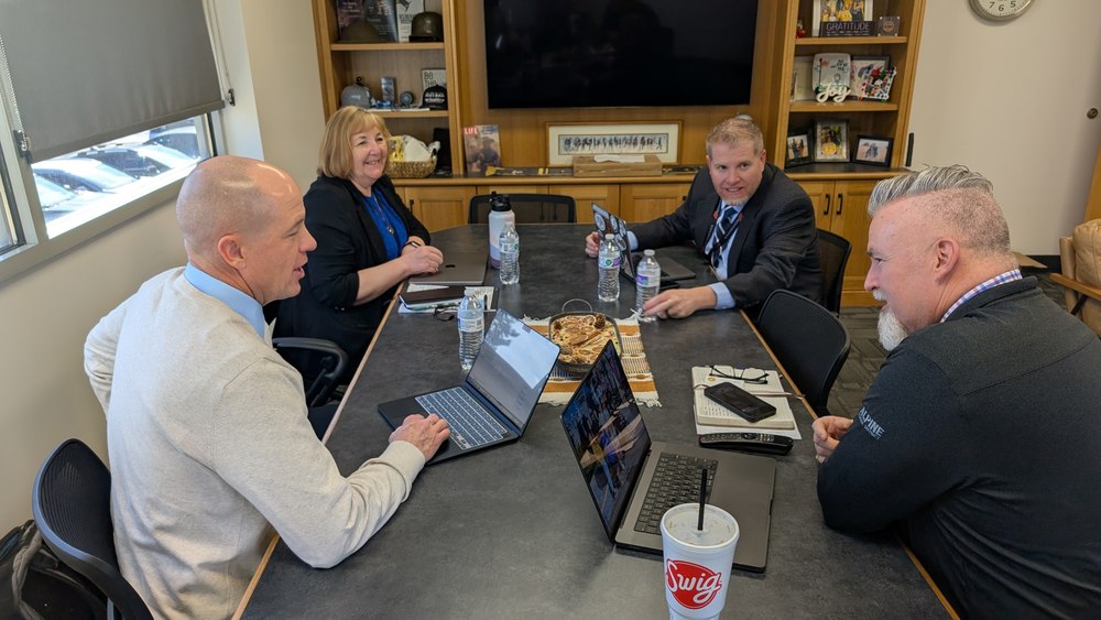 Clockwise from left: Joe Jensen, Vicki Carter, Joel Perkins, and Rob Smith