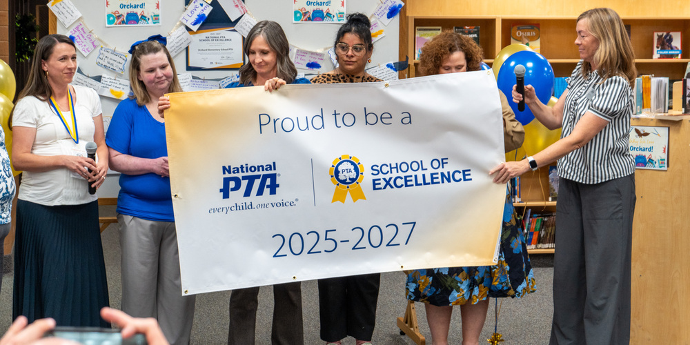 Orchard Elementary School with their PTA School of Excelence banner