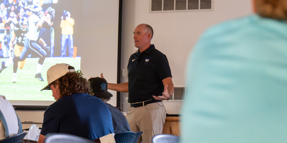 Chad Lewis presenting in front of classroom of student-athletes at Captains Academy