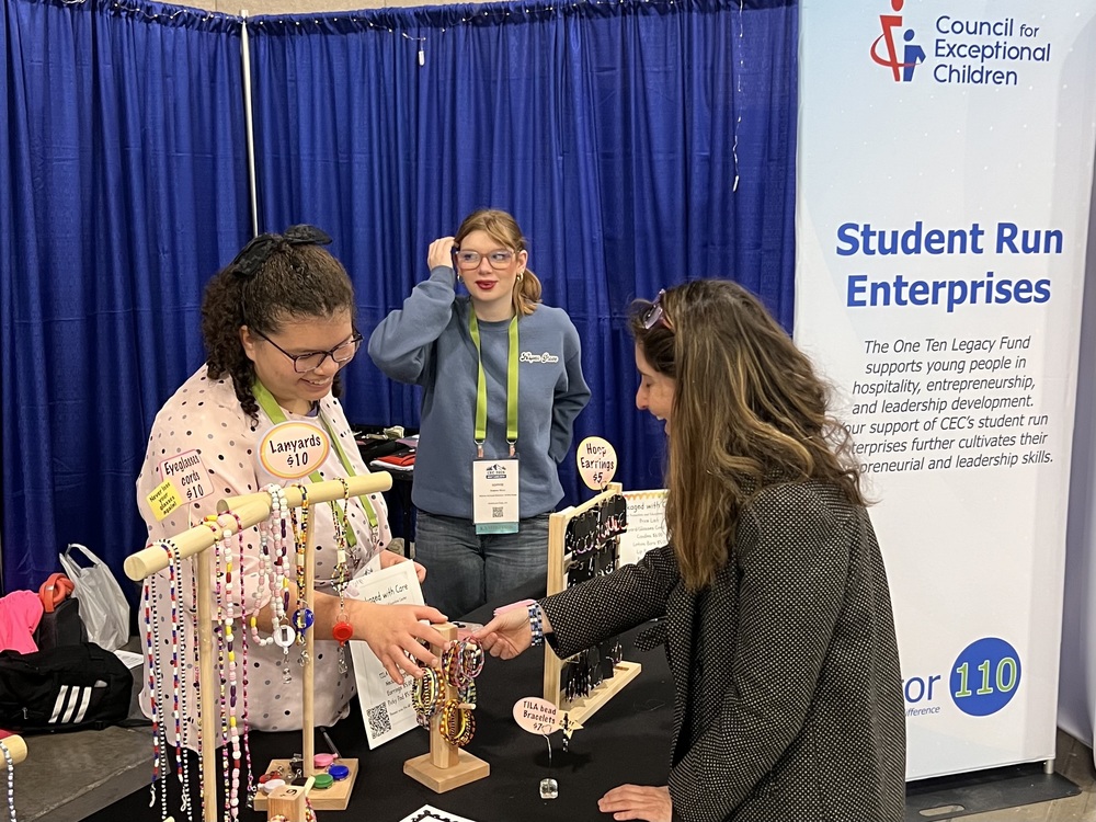 ATEC students man a sales booth