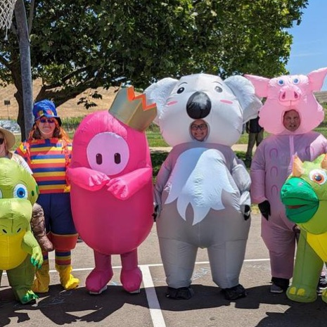 adults in inflatable costumes