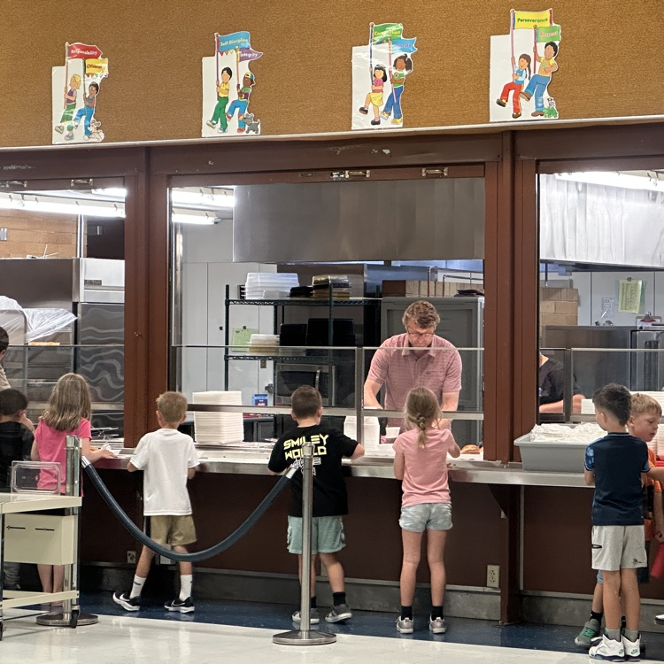 Mr. Killpack serving lunch