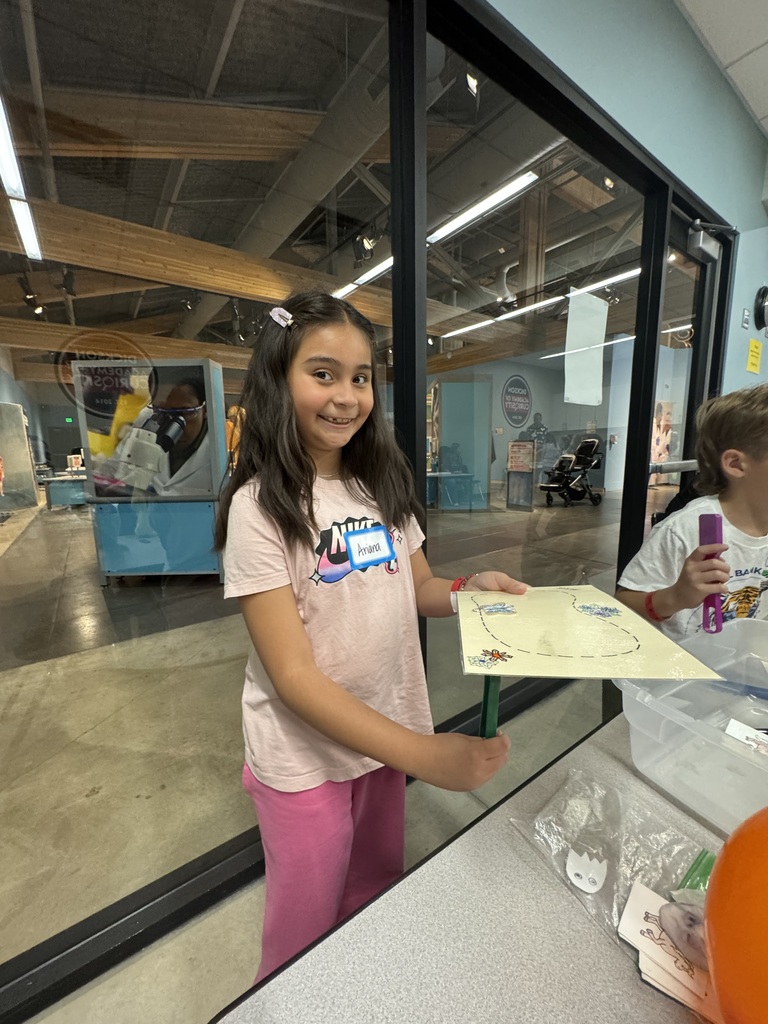 student doing a science experiment