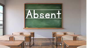 Student desks with chalkboard and word absent