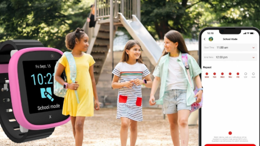 Students on the playground, smart watch and phone