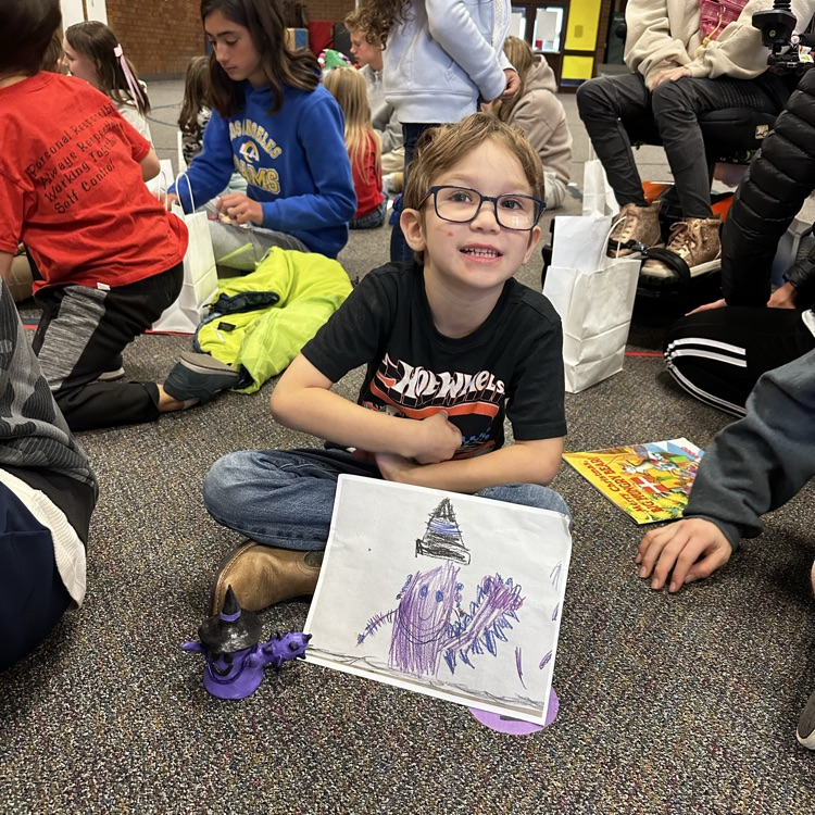 student sitting on floor