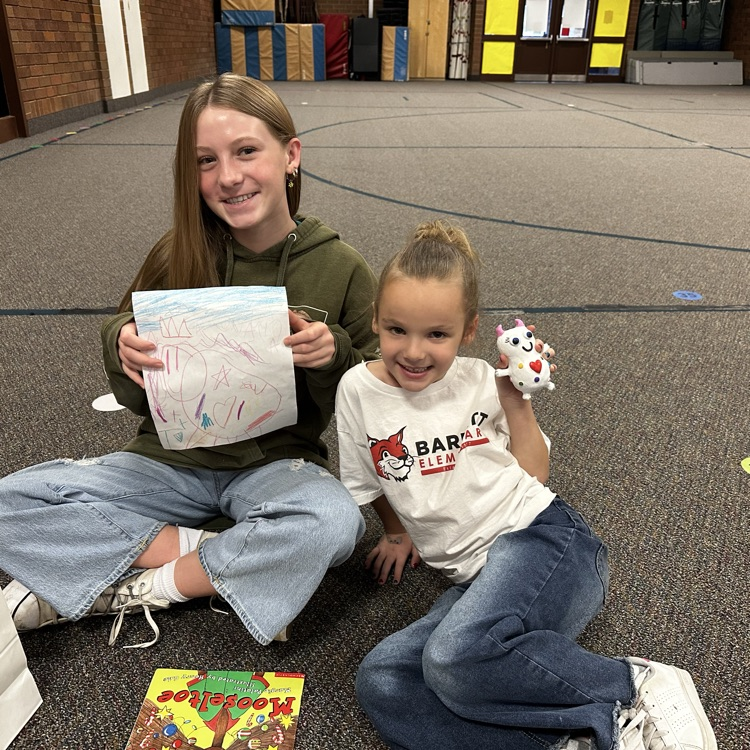 students sitting on the floor