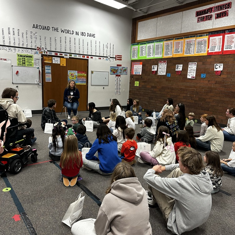 students sitting on the floor
