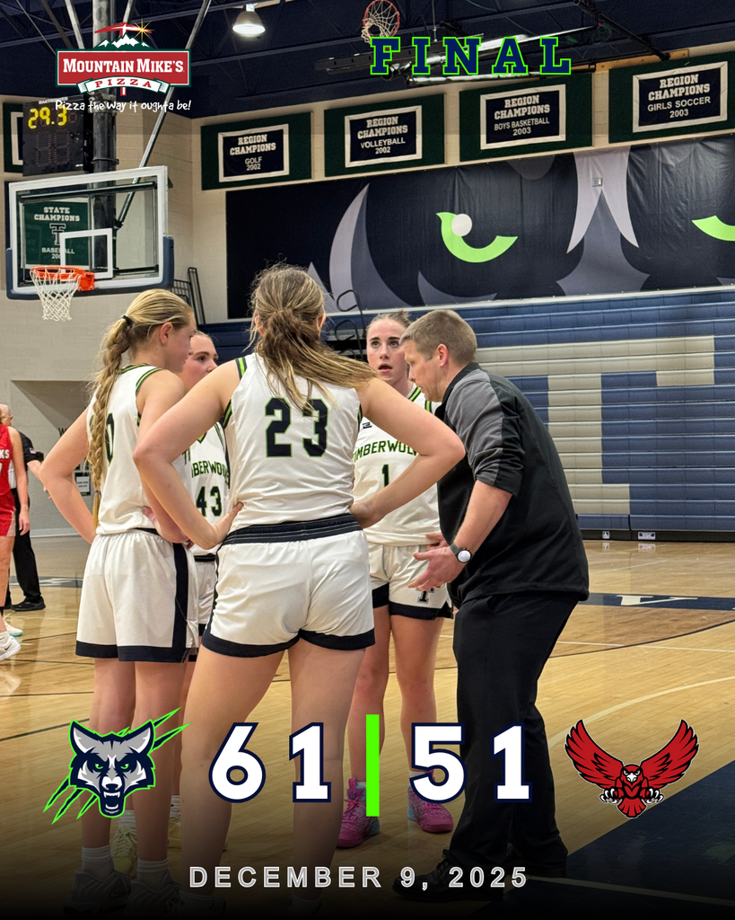 A group of Timpanogos girls basketball players in white uniforms huddle around their coach during a timeout inside The Den. Championship banners hang in the background. The graphic shows “Final” with Timpanogos defeating South Summit 61–51, dated December 9, 2025, with the Mountain Mike’s Pizza logo in the corner.