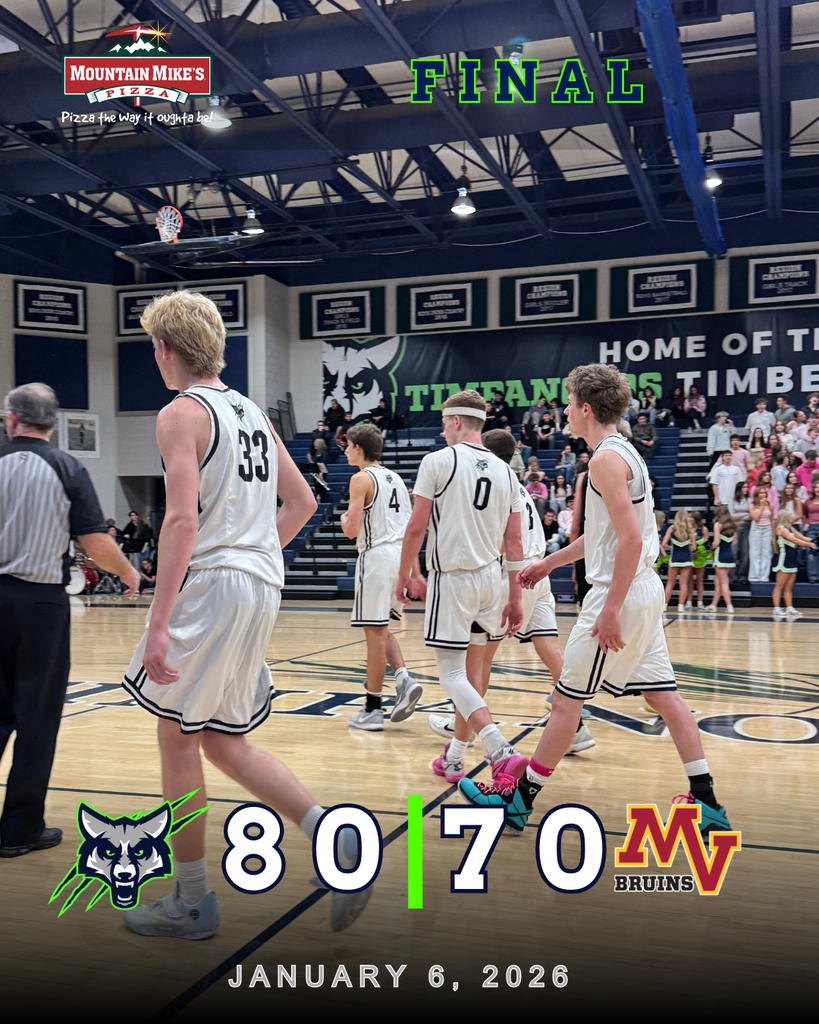 Timpanogos boys basketball players in white uniforms walk off the court after a home game at The Den, with a graphic overlay showing a final score of 80–70 over Mountain View on January 6, 2026, and fans standing in the background.