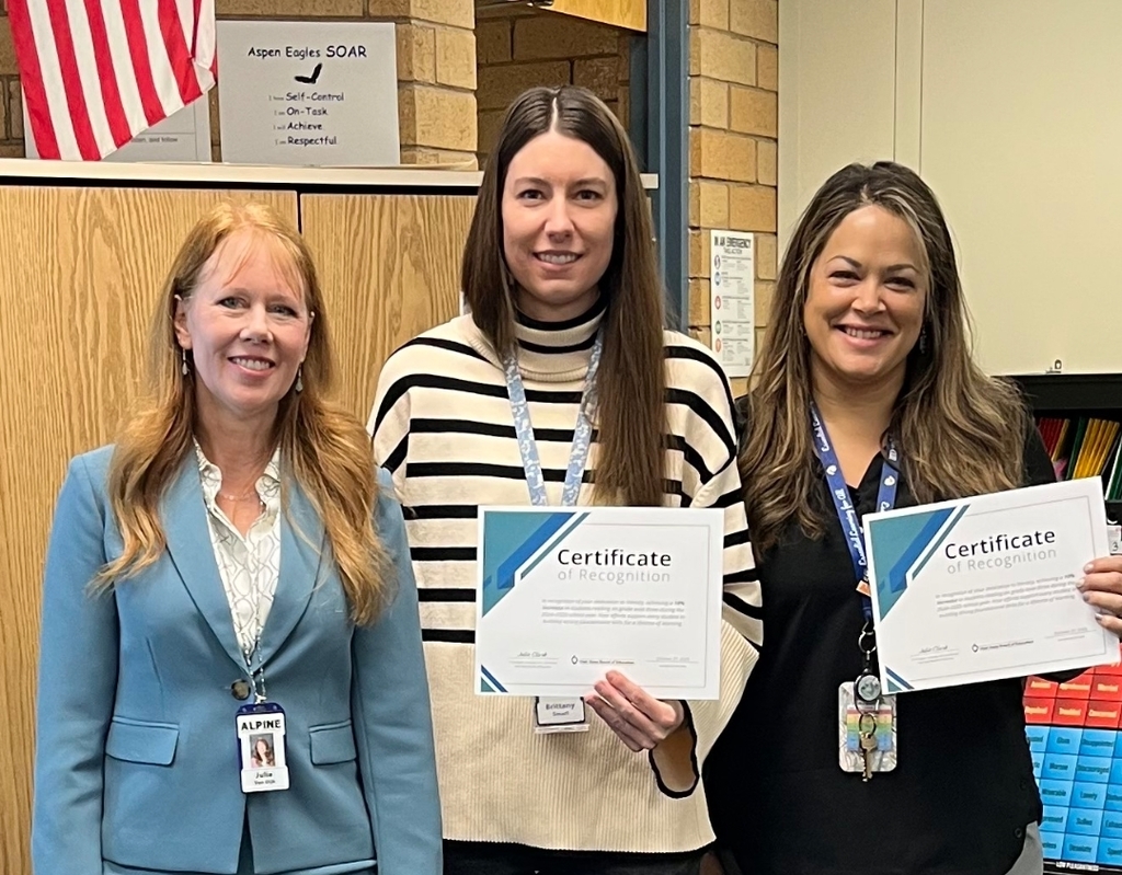 Mrs. van Dijk presents certificate to last year's 3rd grade teachers, Miss Smart & Mrs. Sanborn