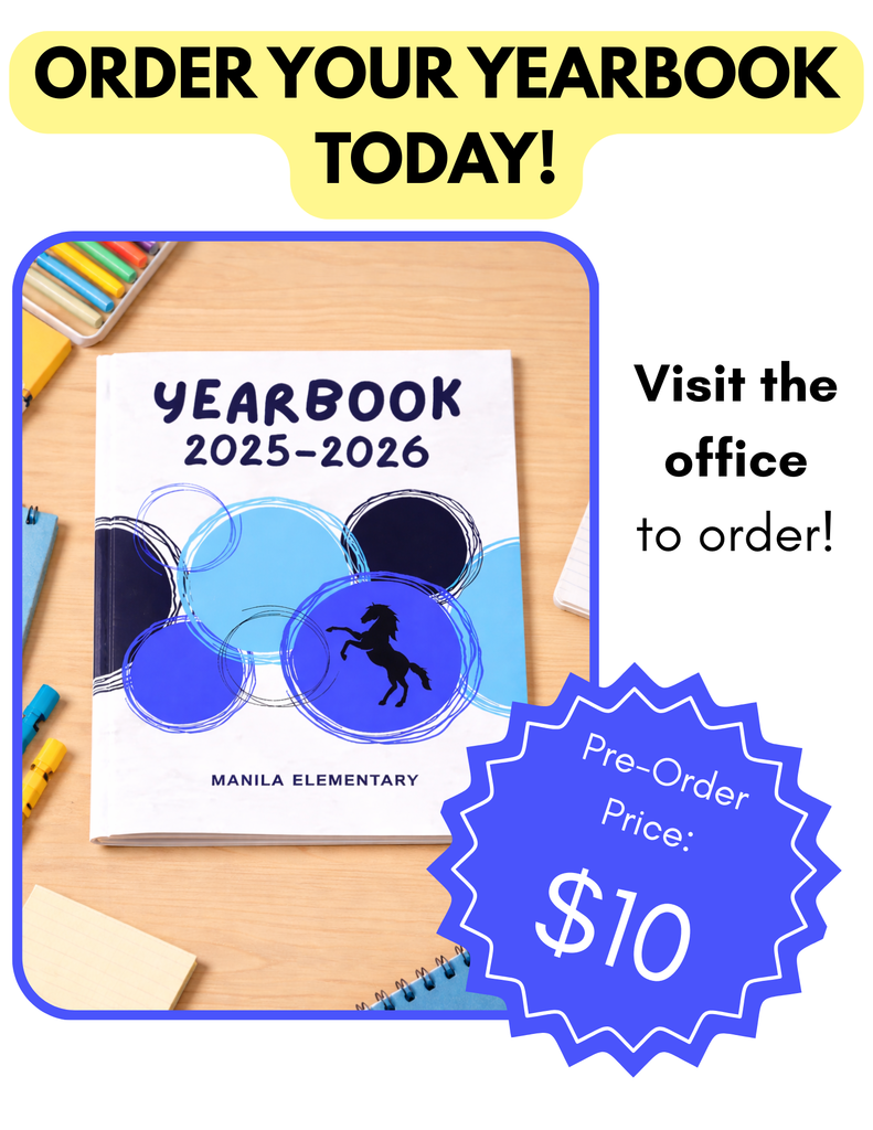 Picture of yearbook on desk with pens