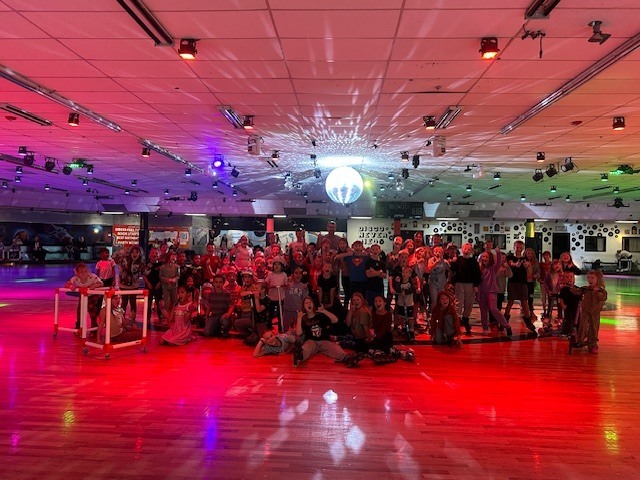 Students at skate night on the rink