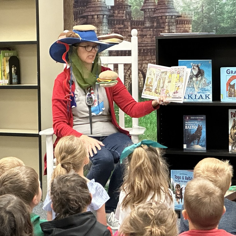 Mrs. Chadwick reading to students  