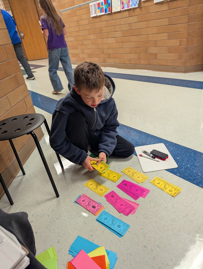 Students calculating income tax