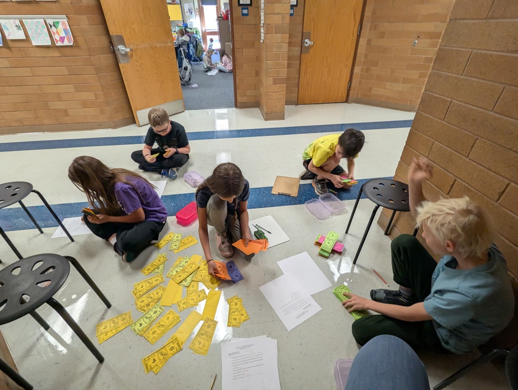 Students calculating income tax