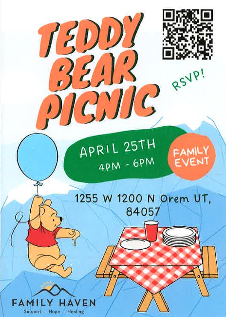 Picnic table with a bear and balloon