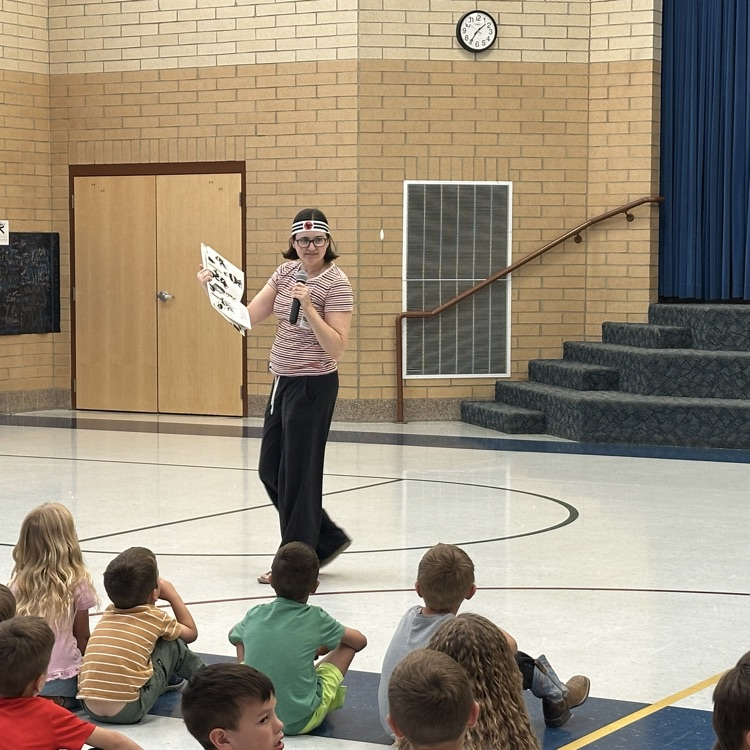 mrs. Bee reading a ninja book