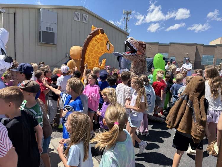 Mascot Race contestants with students