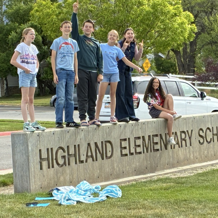 students on highland cement name sign