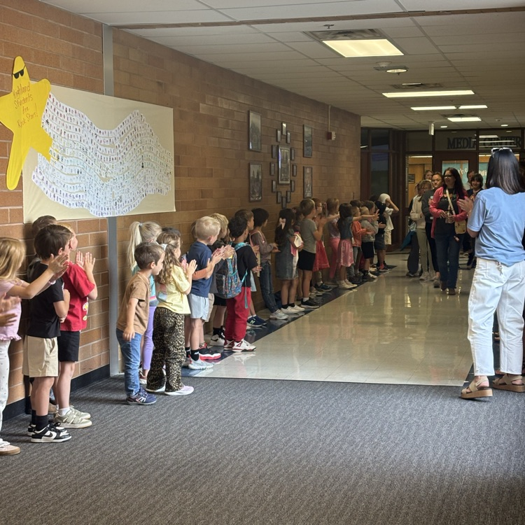 students walking in the halls at the last day clap out