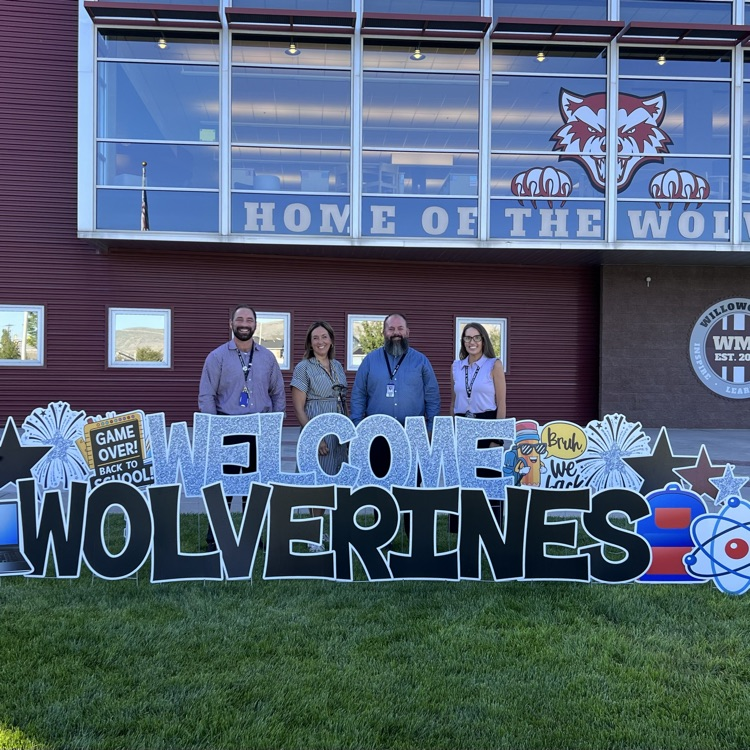 picture of school principal’s in front of the school