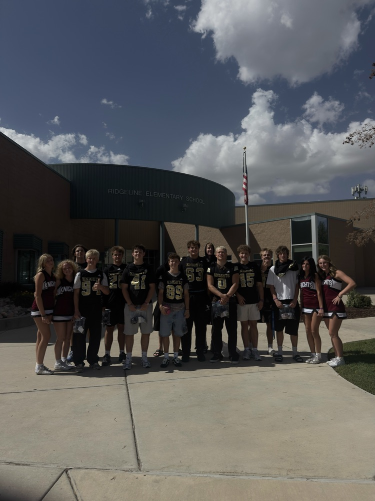 Lone Peak Football and cheer visit Ridgeline
