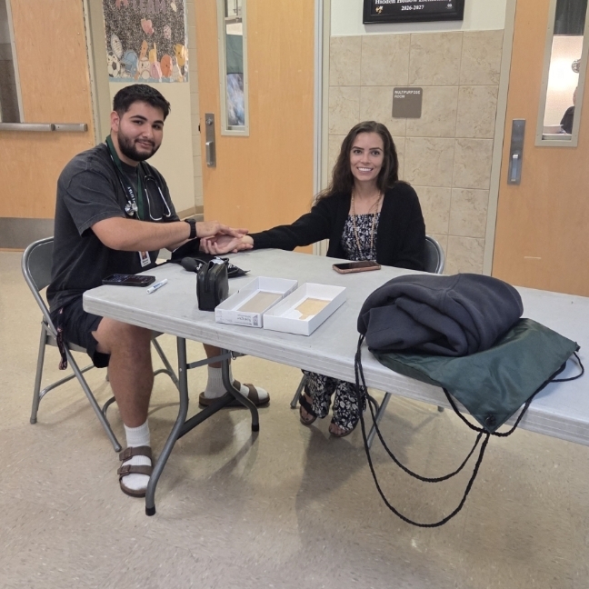 Custodian doing blood pressure