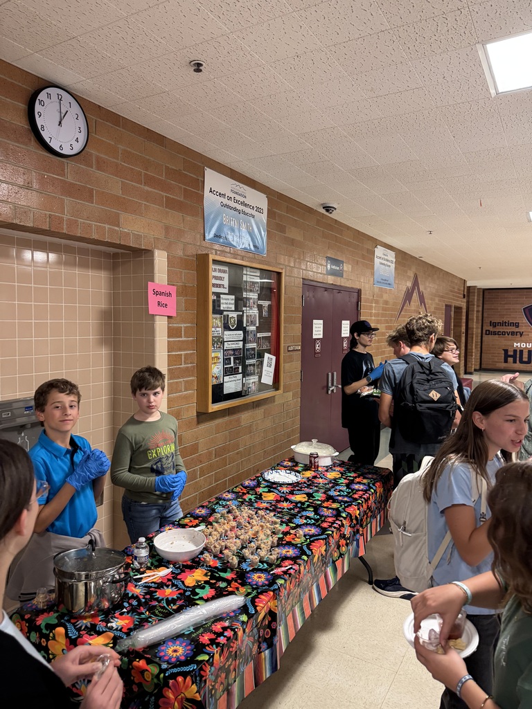 Student in commons around a table