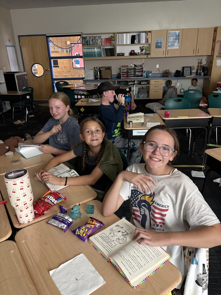 students reading at desks