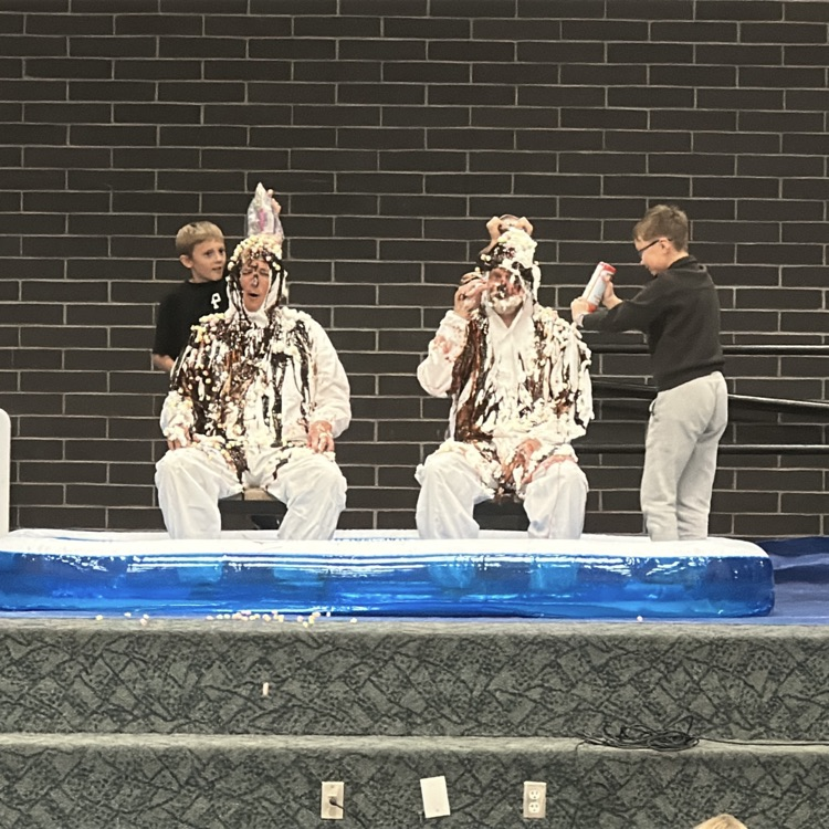 mr. Killpack and Mr. Campbell being made into human Sundaes