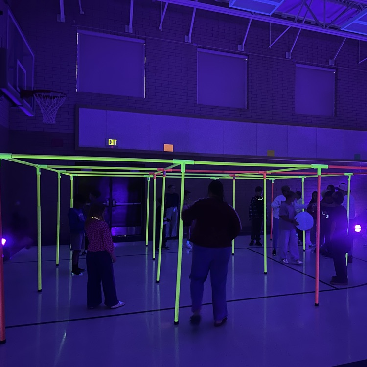 students at the black light dance party 