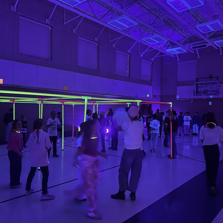 students at the black light dance party 