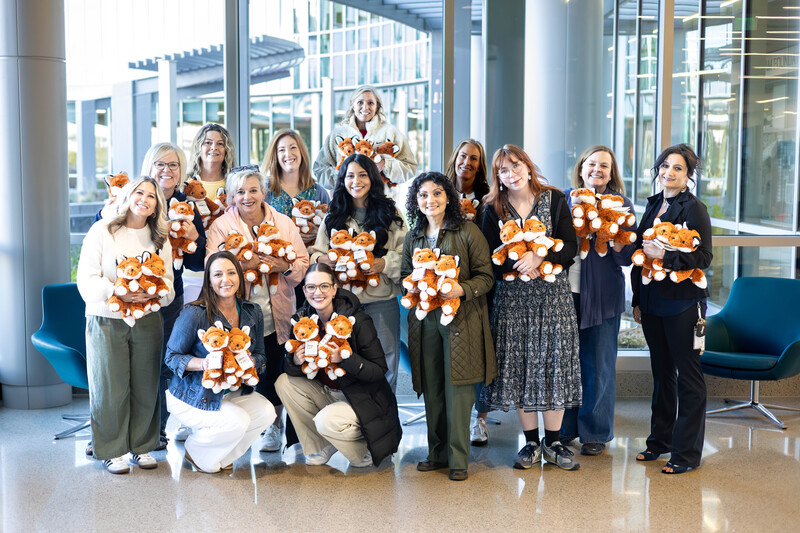fox hollow staff holding stuffed animals