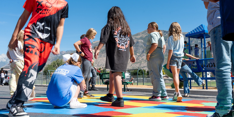 Kids playing on freshly painted blacktop game at recess