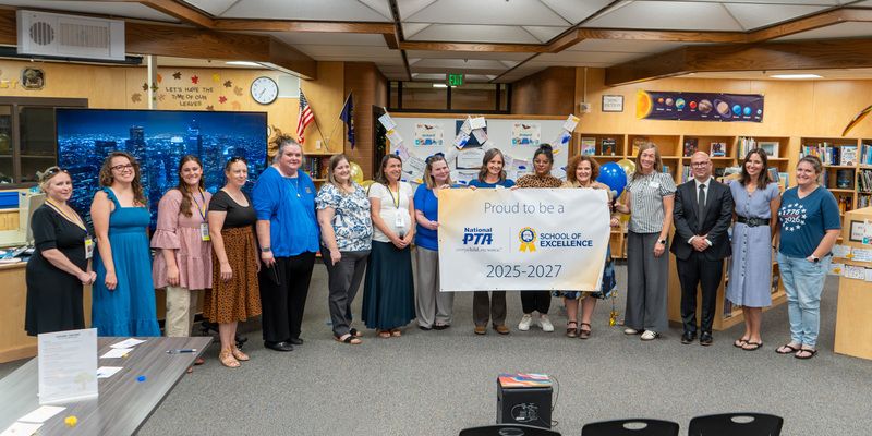 Orchard Elementary School PTA School of Esxcellence certificate surrounded by notes from students to the PTA