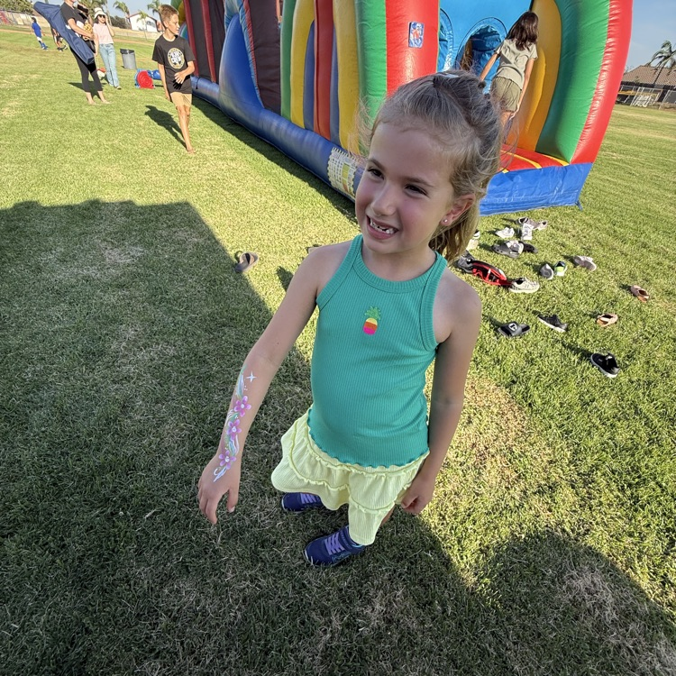 child with arm painted
