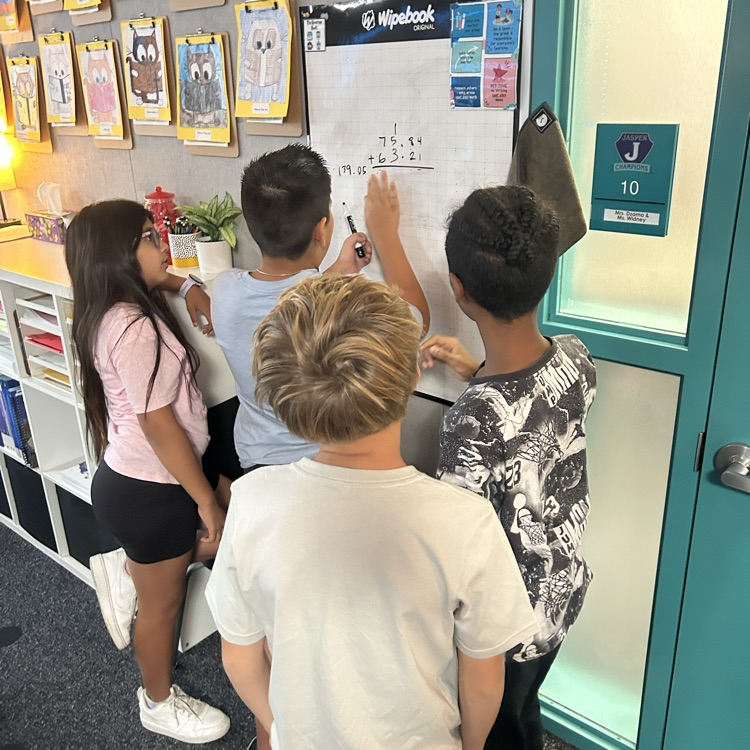 students working on vertical surfaces