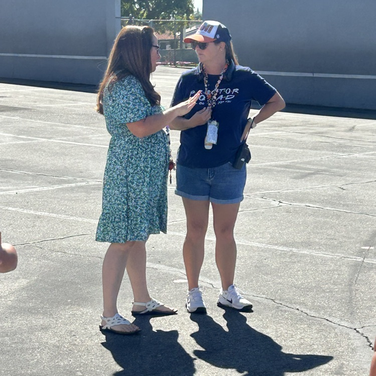 principal Rice talking to a proctor