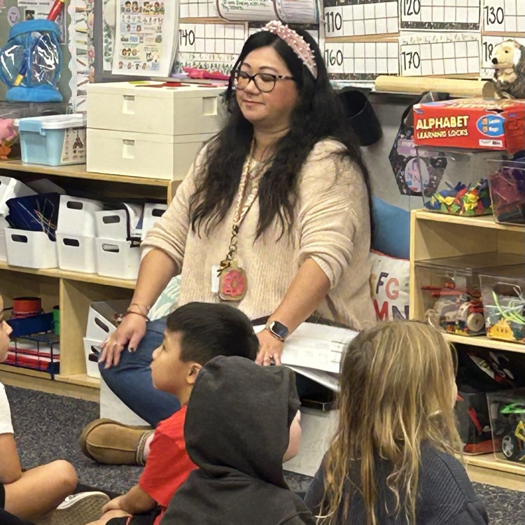 A teacher with her students