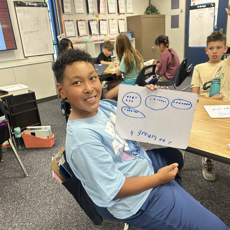 boy with whiteboard