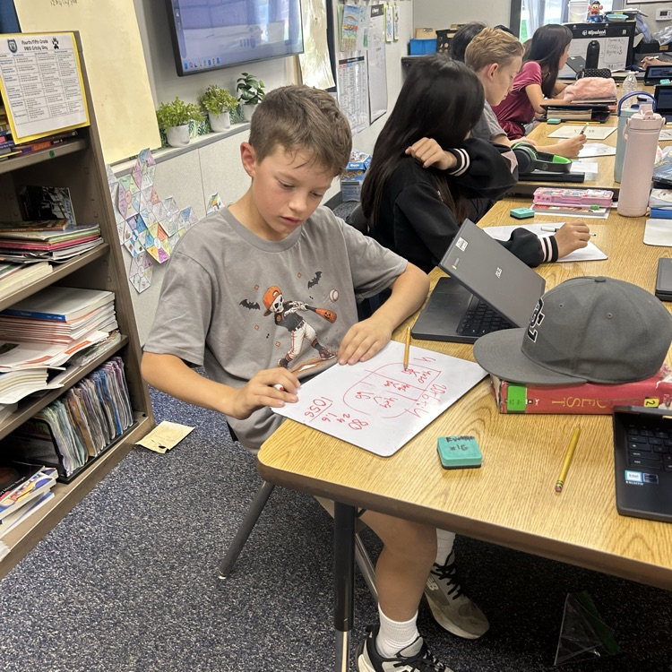 boy 2 with whiteboard