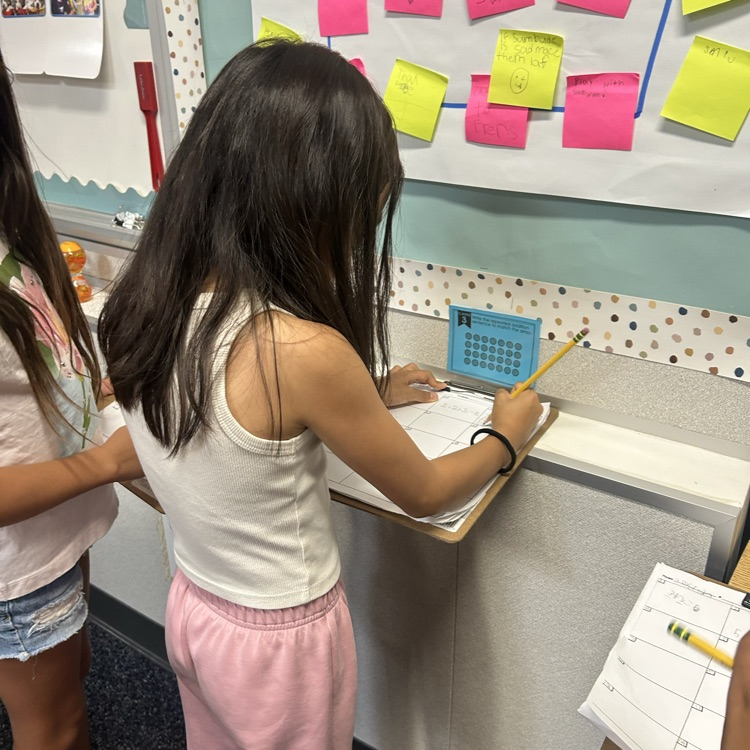 A student working with vertical surfaces