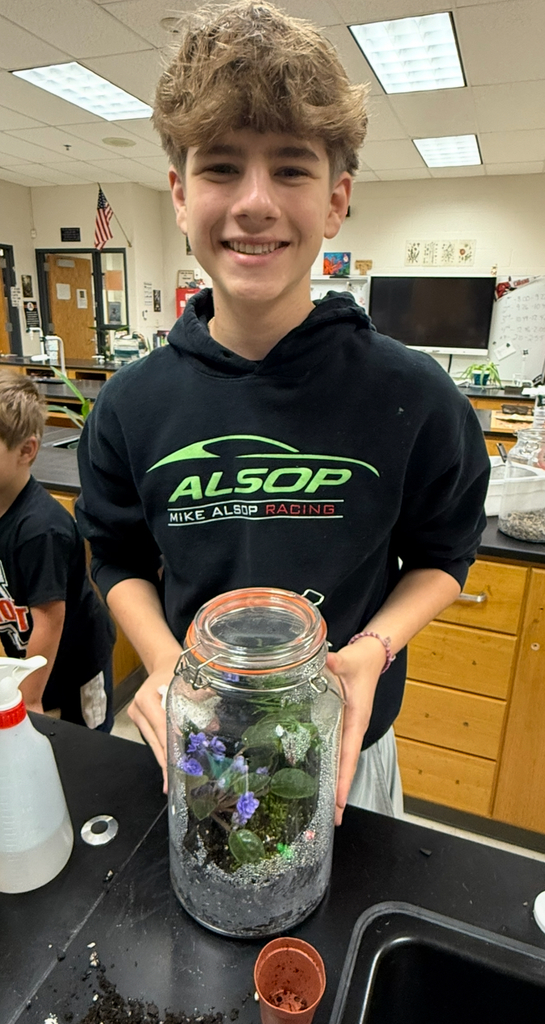 Landon showing off his terrarium